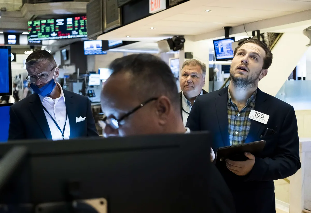 Investors react to strong rise in stock market on Wall Street