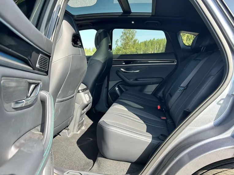 The rear seats are messy. Perfect for traveling even with three adults.