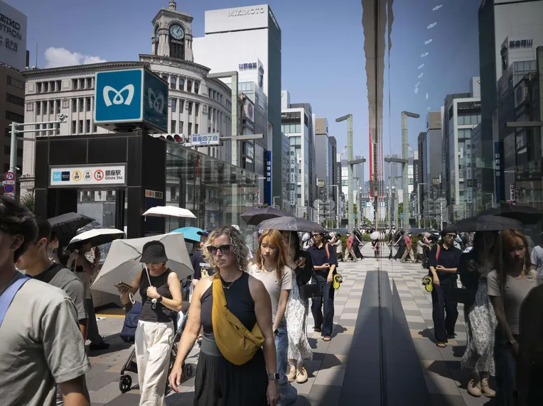 Tokyo's central shopping and cultural centers include the Ginza district in the city's core. This view from Ginza's main street in August.